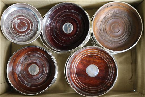 Three pairs of modern silver wine coasters and three others.